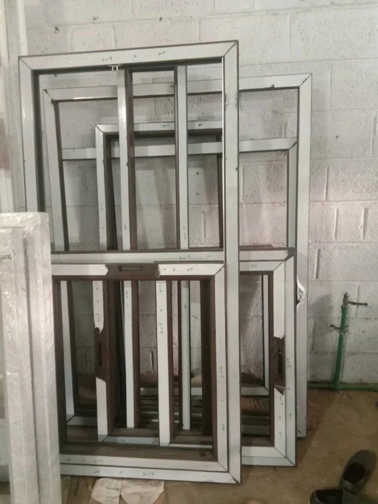 uPVC window frames with inbuilt grill sections by Dolphin Windows